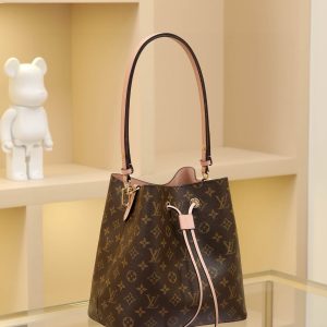 Alternative view of Monogram coated canvas Smooth calf leather trim Microfiber lining Central zippered patch pocket Removable, adjustable shoulder strap! Dimensions: 26x26x17.5cm